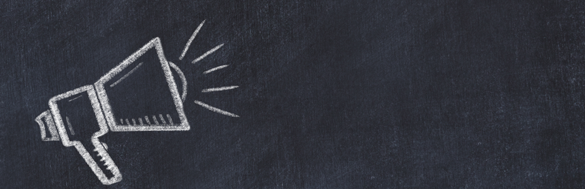 Drawing of megaphone on chalkboard.